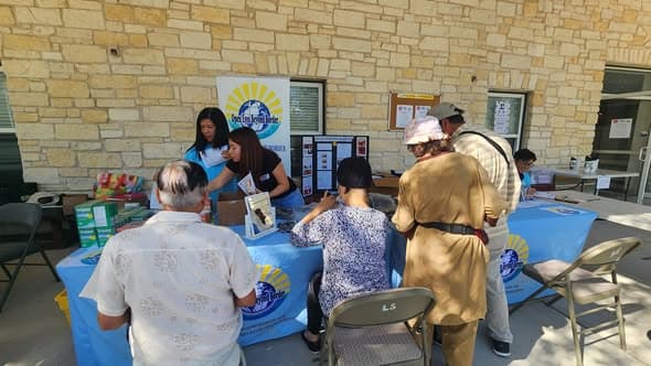 Volunteers assisting seniors